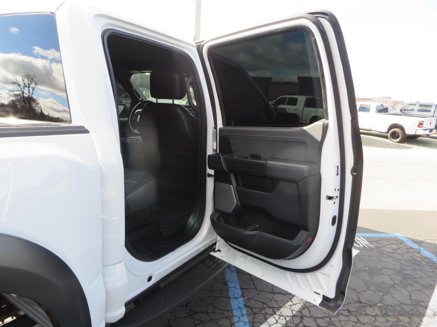 2023 White /BLACK Ford F-150 Raptor SuperCrew 4WD (1FTFW1RG6PF) with an 3.5 V6 engine, 6A transmission, located at 2630 Grass Valley Highway, Auburn, CA, 95603, (530) 508-5100, 38.937893, -121.095482 - Raptor sitting on Eibach front and rear springs, 37" Nitto Ridge Grappler tires, 17" Method NV wheels, and window tint. - Photo#52